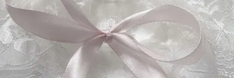 Banner com laço de cetim